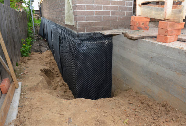 Happy homeowners after waterproofing job in Cincinnati